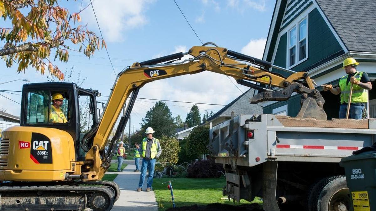 
Cascade Natural Gas crew members work to fix a broken gas line in the 2100 block of H Street on Wednesday morning, Oct. 14, in Bellingham, Wash.
