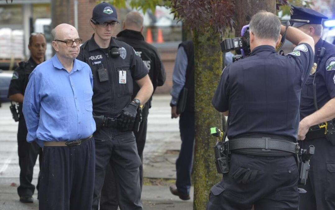 Bellingham Police arrest Richard Kenneth Gorton after a robbery of the Banner Bank on York Street in downtown Bellingham Oct 14, 2014. Gorton passed a note to a bank employee saying that he was robbing the bank and waited outside for the police to arrive.