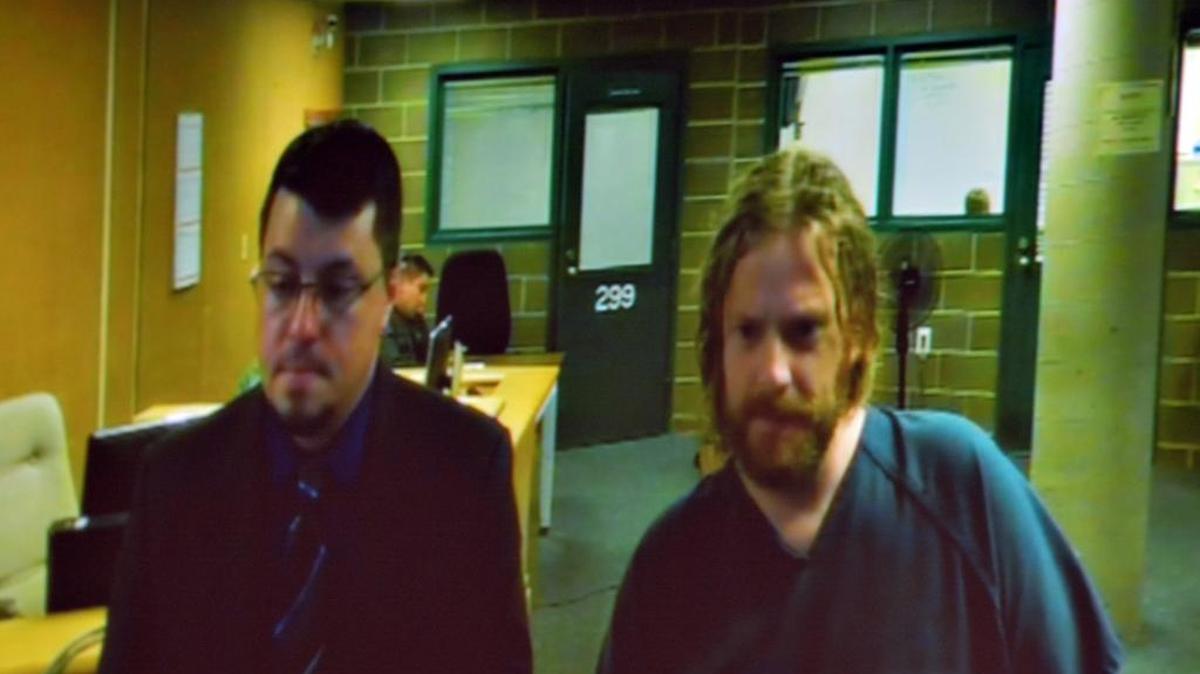 Timothy Jay Newman, 45, right, appears in Whatcom County Superior Court alongside private defense attorney Adrian Madrone on Wednesday, June 7, 2017. A housemate reported Newman threatened her with a .22-caliber rifle and burned her clothes. Sheriff’s deputies suspect he was having a mental episode.