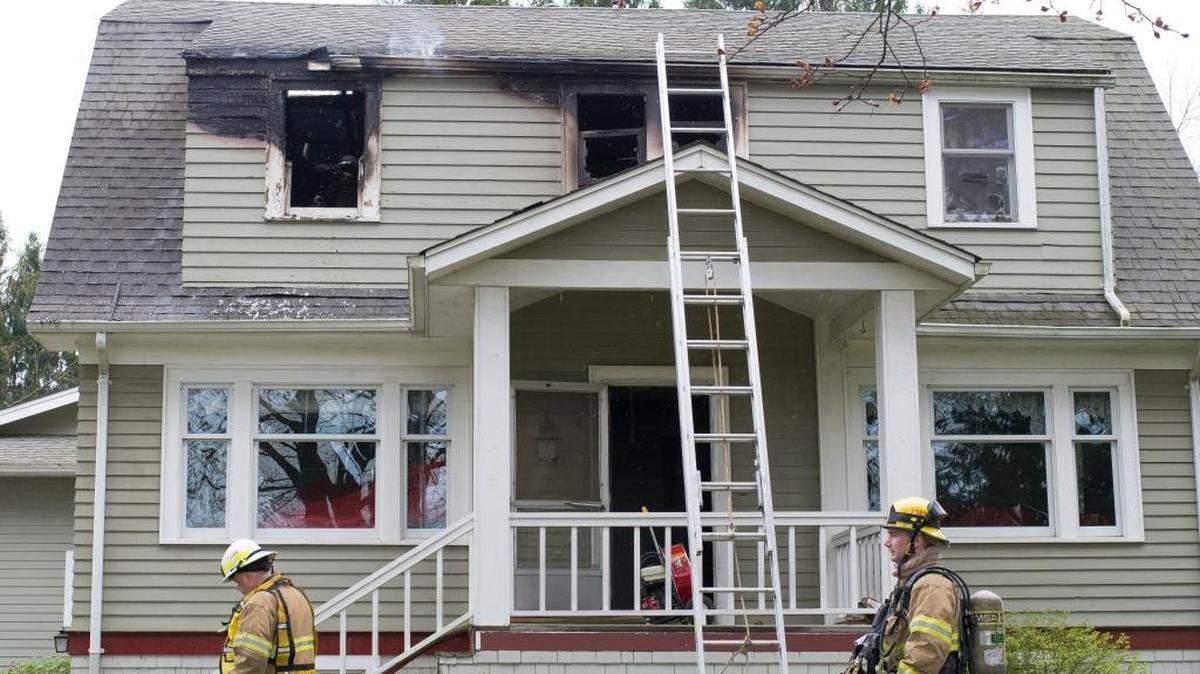 Firefighters work to put out a fire in a house on Woodlyn Road near Ferndale on Thursday afternoon, March 24. Whatcom County Fire District 7 and North Whatcom Fire and Rescue responded to the fire.