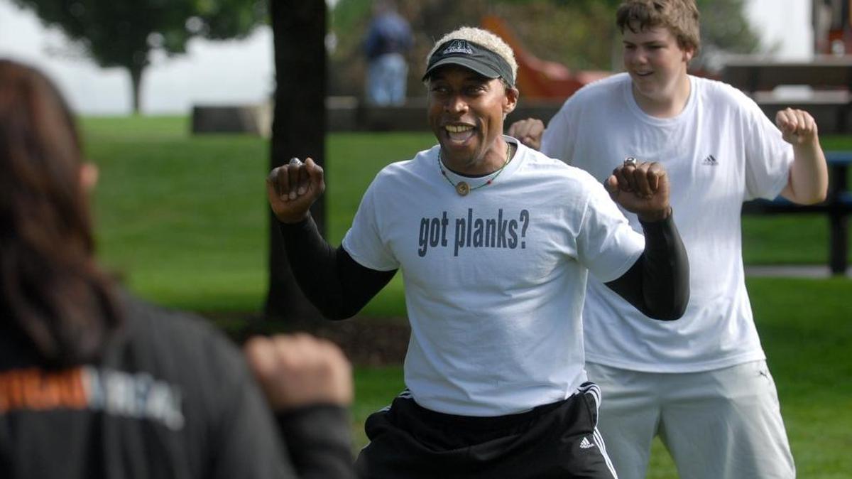 Anthony McClanahan, works out with one of his morning classes at Boulevard Park in Bellingham on July 15, 2009.