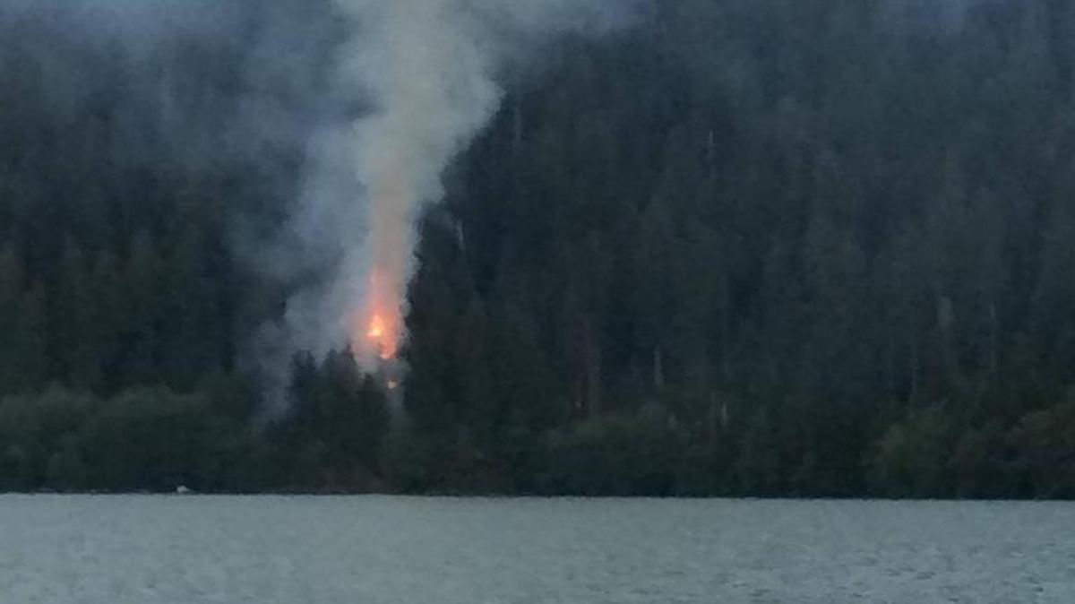 
A one-acre wildfire burns Tuesday, July 8, on the east shore of Baker Lake.
