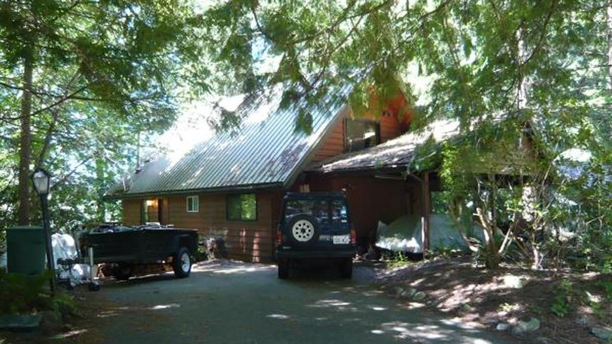 Fire damaged this home at 8 Lookout Mountain Lane on Monday, Nov. 23, 2015, in Sudden Valley.