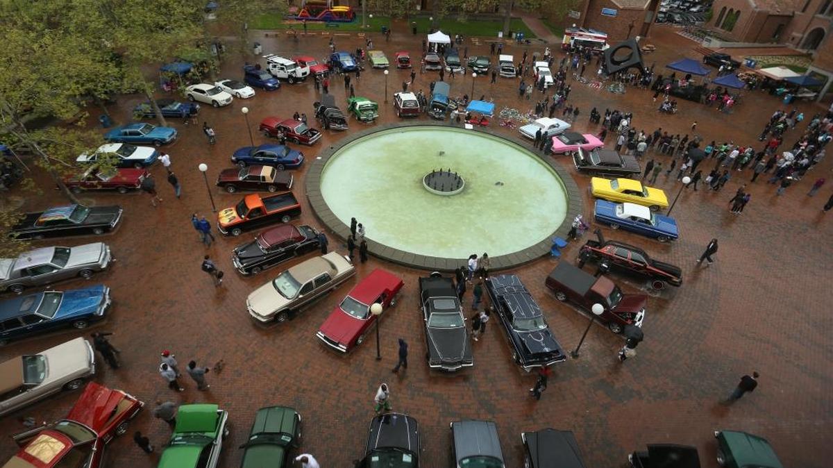 People gather around lowrider cars at Ridin’ Low in the 360 on May 20, 2012, in Red Square at Western Washington University. A person reported seeing a man with a handgun at the annual event on Sunday, May 15, 2016. No one was hurt.