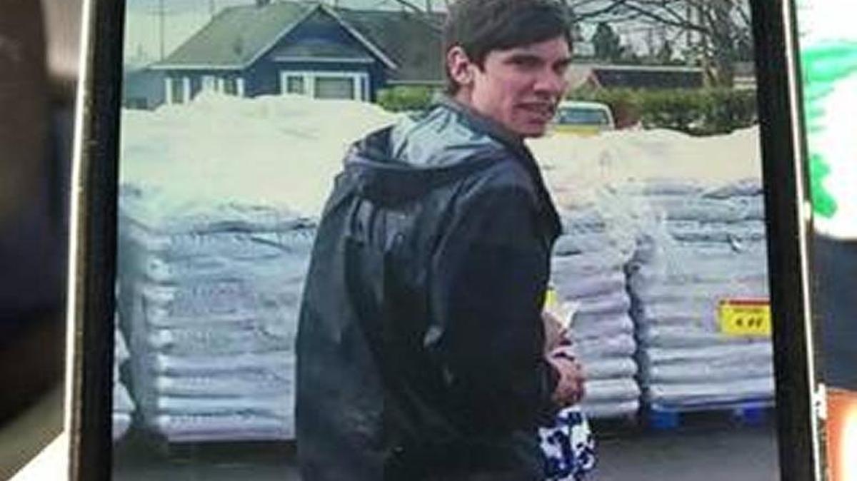 A screenshot showing Dason Christunas, 21, as he fled from a robbery of sandwiches and lunch meat at a Haggen store in Bellingham.