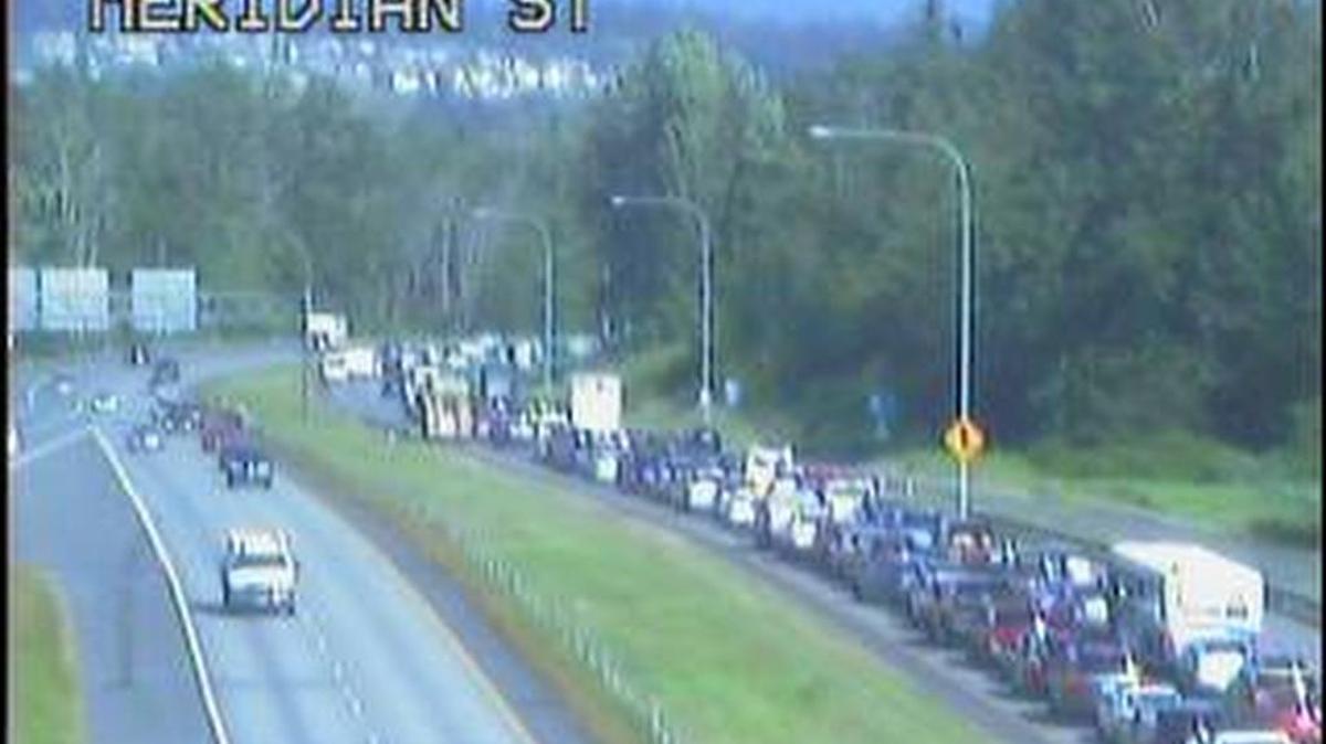Southbound Interstate 5 traffic backs up past Meridian Street after a 3-car crash near Sunset Drive Thursday afternoon, May 12.