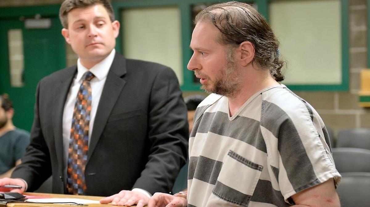 
Darrin Rankin, right, speaks during his first appearance in Whatcom County Superior Court in Jaunary beside his public defender, Darrin Hall. Rankin was sentenced to 18 months in prison Thursday, July 16, for trying to run over a Bellingham police officer.
