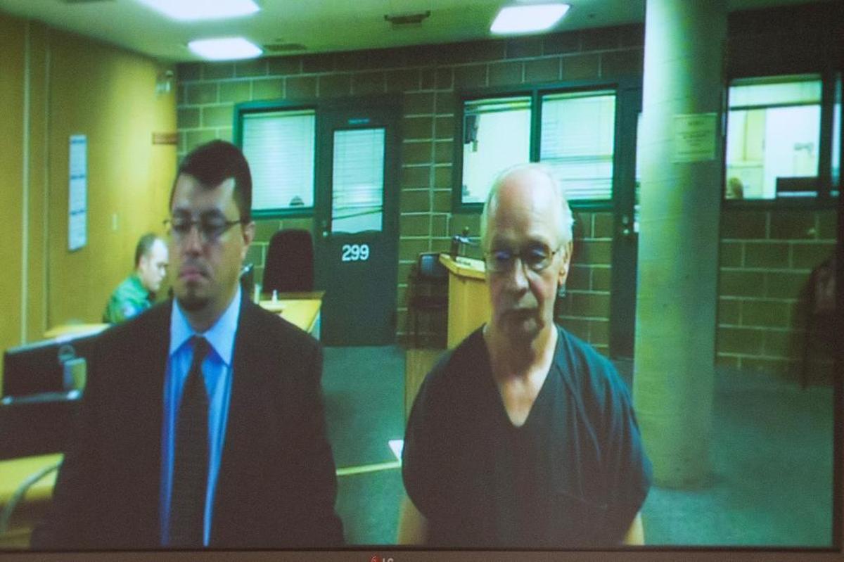 Stuart D. McKay, 69, of Ferndale, right, makes his first appearance in Whatcom County Superior Court Sept. 2. He was sentenced Tuesday to six months in jail with a year of probation for one count of second-degree possession of depictions of minors engaged in sexually explicit conduct.