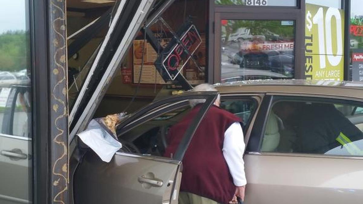 A Honda Accord sits in the entrance of the Papa Murphy’s along Guide Meridian in Lynden after crashing into the store just before 9:40 a.m. on Thursday, April 14. The driver, while pulling up to the storefront, accidentally hit the gas pedal.