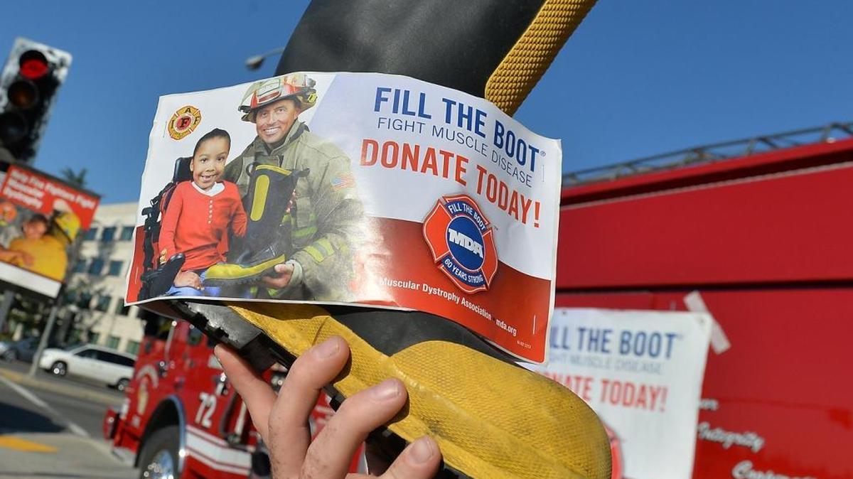 Fresno County firefighters collect donations for the Fill the Boot campaign to benefit the Muscular Dystrophy Association on Tuesday, May 10, 2016 in Fresno, Calif. Bellingham firefighters say an imposter may have been trying to collect money along Meridian Street on Sunday, June 19.