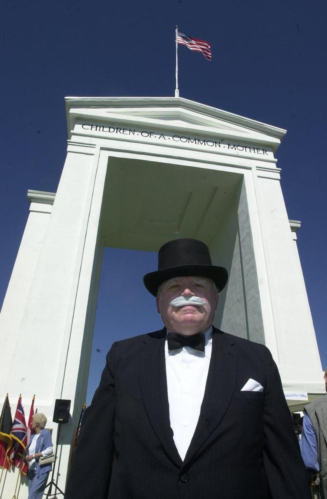 Like a snapshot from history, local Canadian and Whatcom County residents dressed up in 1920s clothing to recreate the dedication of the Peace Arch Monument at the Peace Arch Park on September 8, 2001. It was the 80th anniversary of the original dedication. Ron Leach of Blaine plays Sam Hill, president of the Great Northern Railroad System.