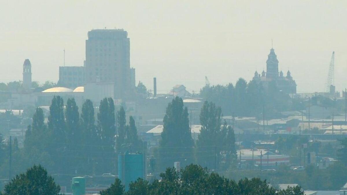 Downtown Bellingham Thursday, Aug. 10, 2017. Smoke from forest fires in British Columbia continues to cover Whatcom County, but should begin clearing by midday Friday, according to the National Weather Service.
