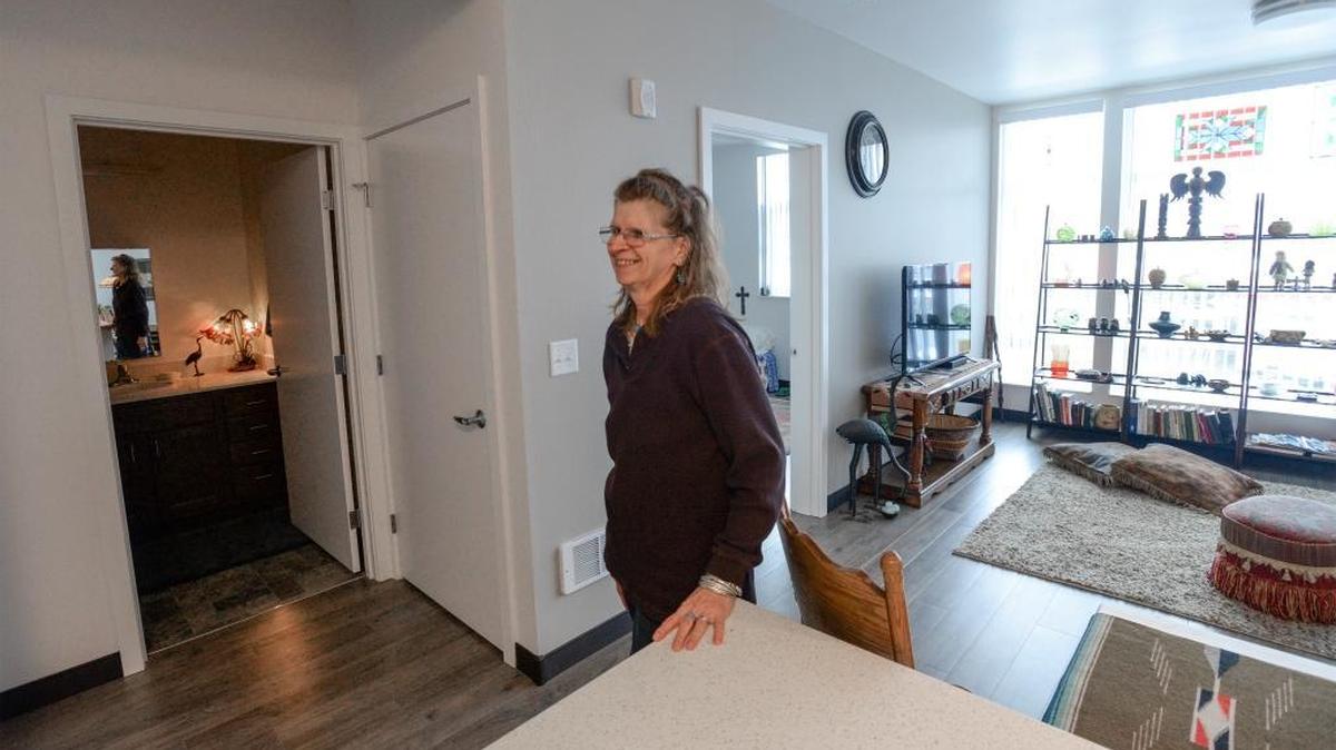 Eileen Vining stands in her apartment at the new Eleanor Apartments in Bellingham on Friday, Nov. 3, 2017. The 80-unit apartment building is for low-income seniors. Vining has lived there three weeks and says it is “pretty doggone neat.”