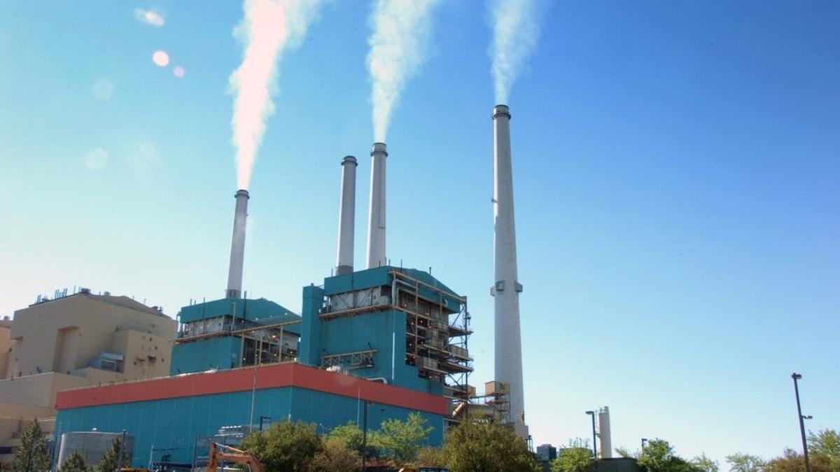 FILE - In this July 1, 2013, file photo, smoke rises from the Colstrip Steam Electric Station, a coal burning power plant in in Colstrip, Mont. Hoping to end the use of coal power in Washington state, lawmakers are proposing measures to help the state’s three private utilities eliminate the electricity they get from out-of-state coal-fired power plants.