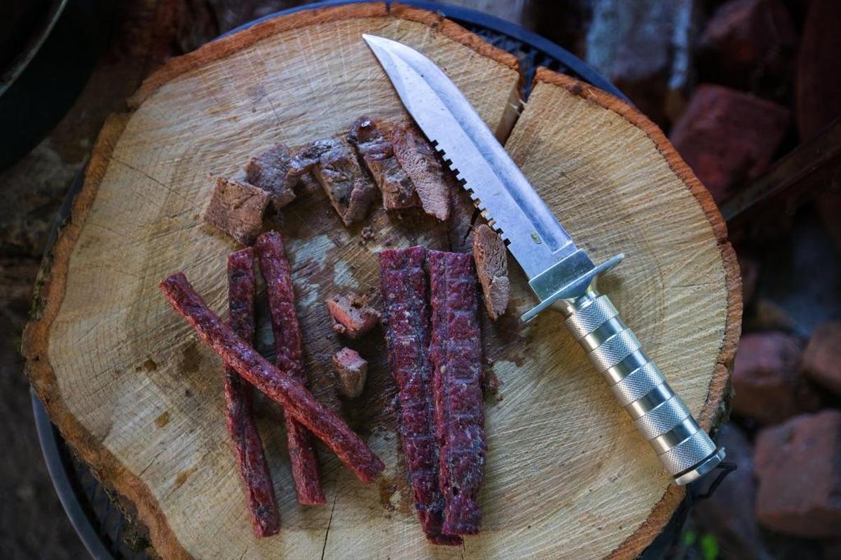 Grilled deer steaks, meat sticks and Landjaeger from deer meat prepared by Tim Bento is displayed July 18, 2017 in Lynden, Washington. Last July, the Washington Fish and Wildlife Commission changed state code to allow the salvage of elk and deer accidentally killed by vehicles. In the program’s first year of existence, people plucked nearly 1,600 deer and elk off Washington roadways, according to a Washington Department of Fish and Wildlife database of permits required for salvage.