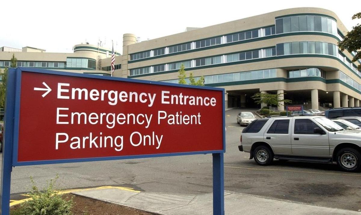 St. Joseph hospital emergency department entrance. PeaceHealth announced this week that 241 positions would be eliminated company-wide.