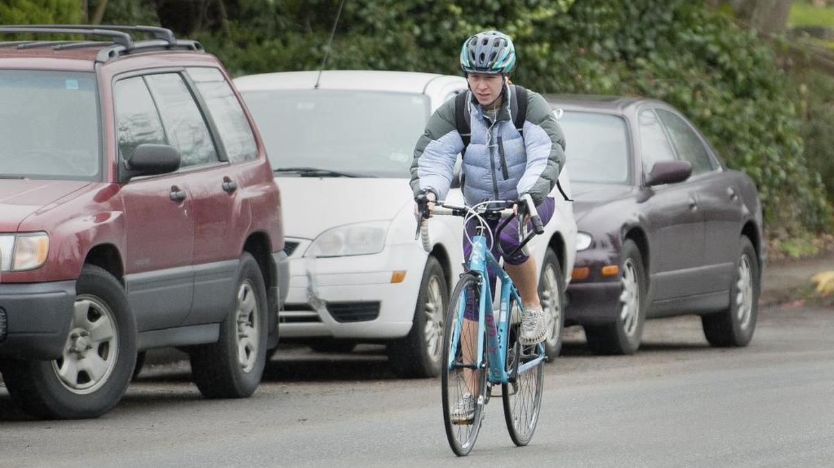 A bicyclist coasts down Billy Frank Jr. Street in 2017 in Bellingham. The city is looking for public feedback in a survey on bike trails for a master plan update.