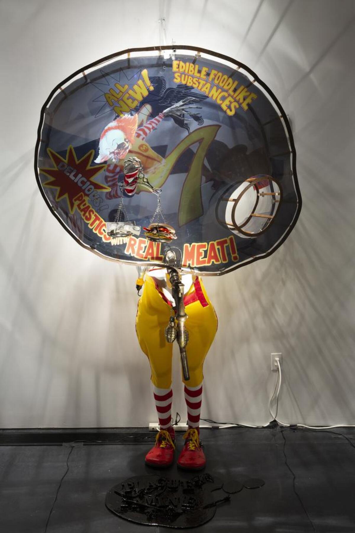 A detail of “Exxon: The Five Horsmen of the Apocalypse” by the artist Ed Bereal at the Whatcom Museum in Bellingham.