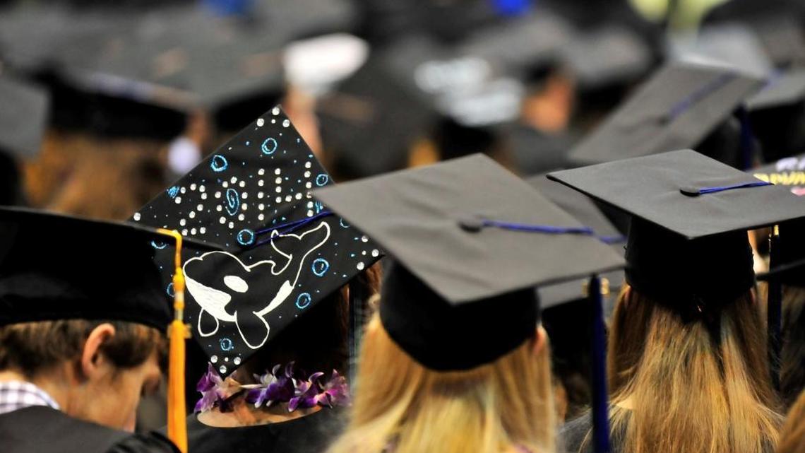 Commencement services for graduating Western Washington University students in Carver Gymnasium at Western in 2014. According to a new report, one factor college grads are leaving Bellingham is that they are seeing more opportunities for job advancement in other places like Seattle.