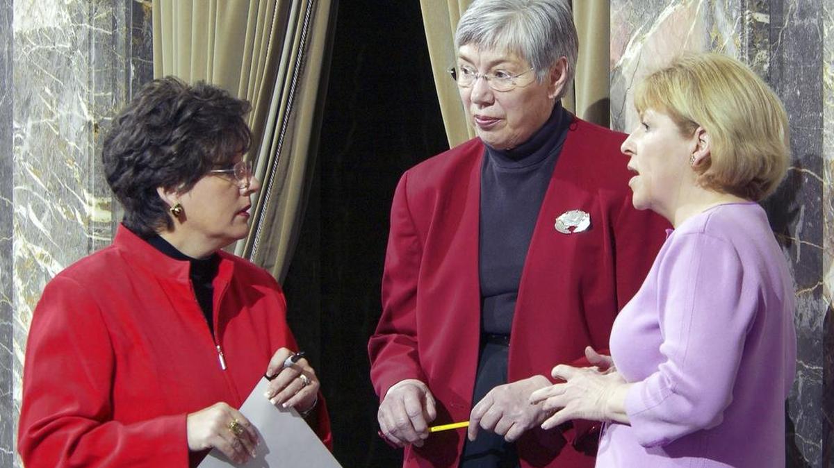 Senators Tracey Eide, Harriet Spanel and Lisa Brown confer on the Washington State Senate floor in Olympia, Wash., in this 2005 photo.