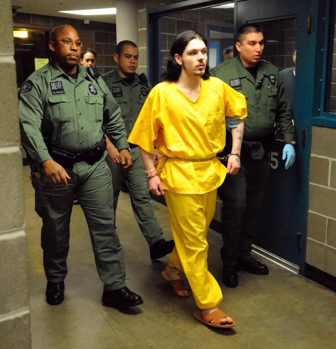 Nathan R. Goninan is escorted to Whatcom County Superior Court in this photo from Dec. 9, 2008. He was sentenced to 10 years in prison for killing Bellingham resident Jessica Franklin, 17, nearly 10 years ago.