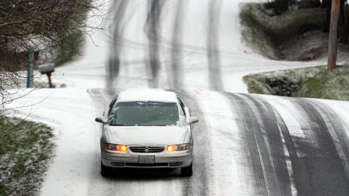 A driver negotiates slick streets on Donovan Avenue in Bellingham on Monday morning, Jan. 4, 2016.