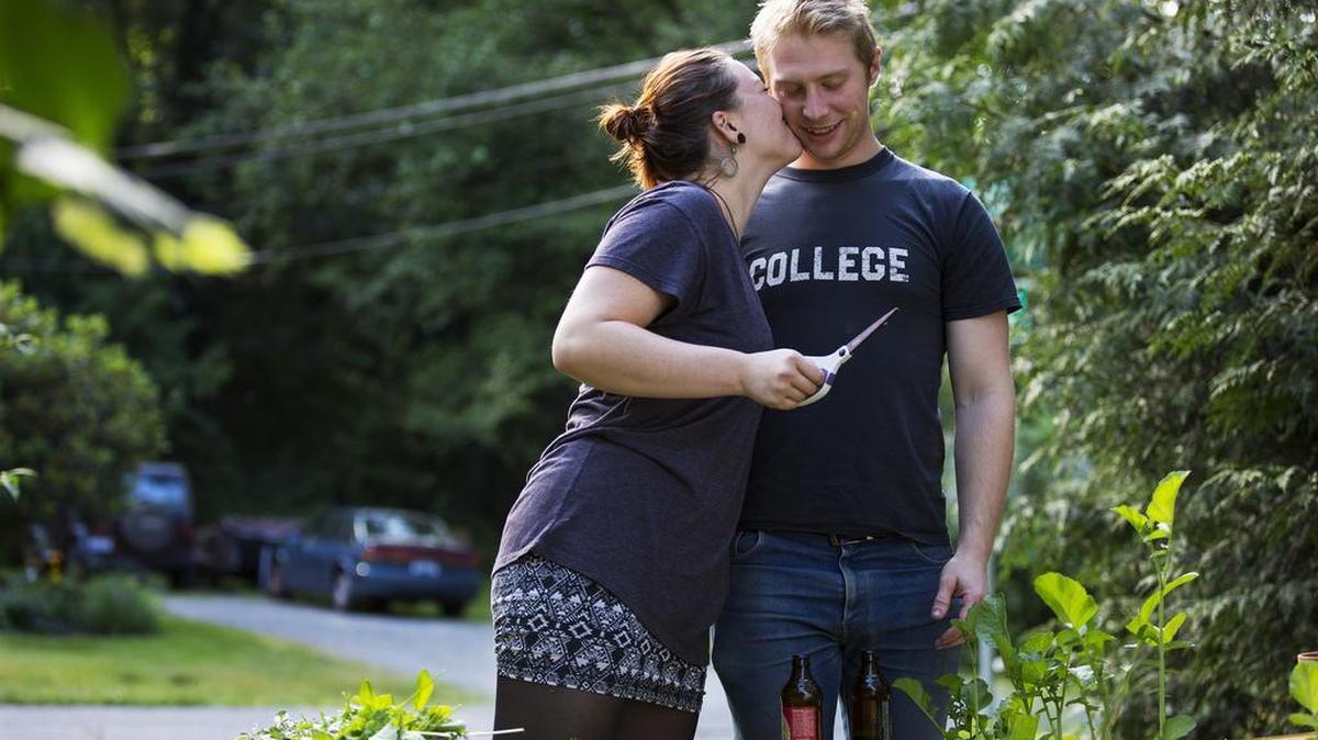 Riley Spicer and her boyfriend, Jakob Lundy, tend to their garden at home in Seattle on June 9, 2016. Though Spicer has secured a position at a coveted tech academy here, she, like so many in her generation, is anxious about her economic outlook and the future in general. “The political system seems so overwhelmingly broken that I have no idea what to do about it,” Spicer said.