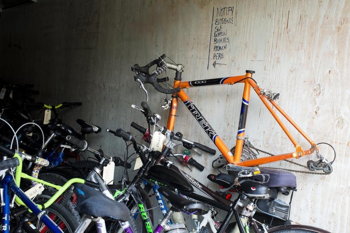Bicycles fill a storage container at the Bellingham Police Department.