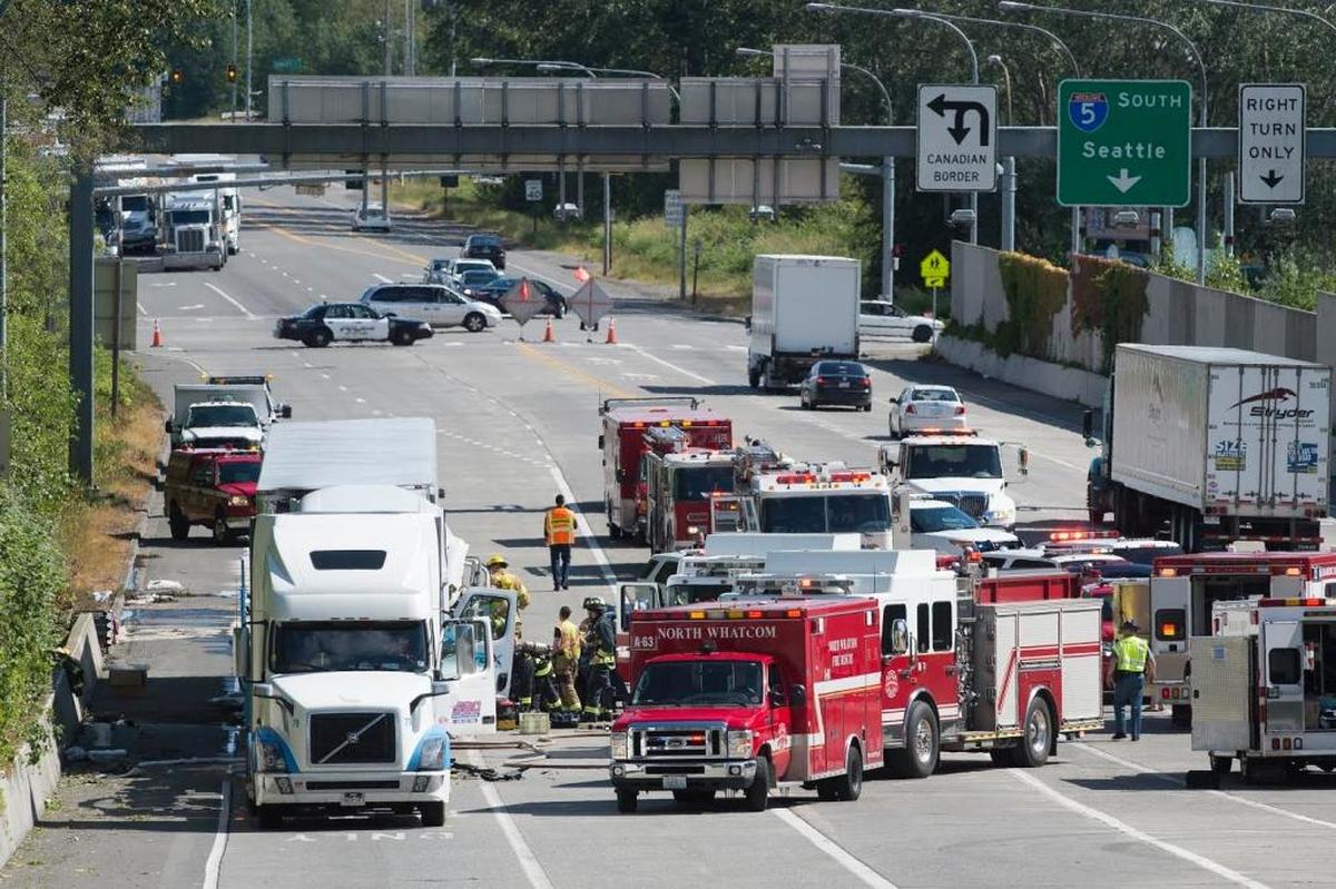 Two drivers were injured when three semi trucks crashed in a chain reaction that shut down Pacific Highway on Friday, June 9, just south of a U.S.-Canada border crossing in Blaine, Washington.