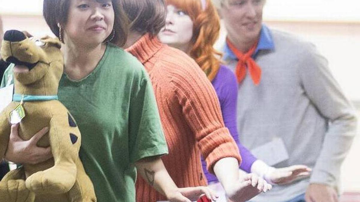Joanna Mong, Kimmy McClement, Emmie Mac and Erik Sundberg, pictured from left to right, walk down the costume contest runway as the Scooby-Doo Gang at the 2015 Bellingham ComiCon on Saturday, Oct. 24, at the Ferndale Event Center in Ferndale, Wash. Mong, McClement, Mac and Sundberg took first place for best costumed group.