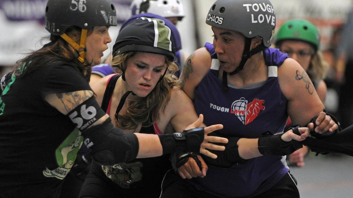 
Bellingham Roller Betties team Tough Love took on Margarita Villains, of British Columbia, in Orca Gym at Whatcom Community College on May 10, 2014. The Roller Betties are doing a free outdoor Downtown Throwdown on Saturday, Aug. 22, 2015.
