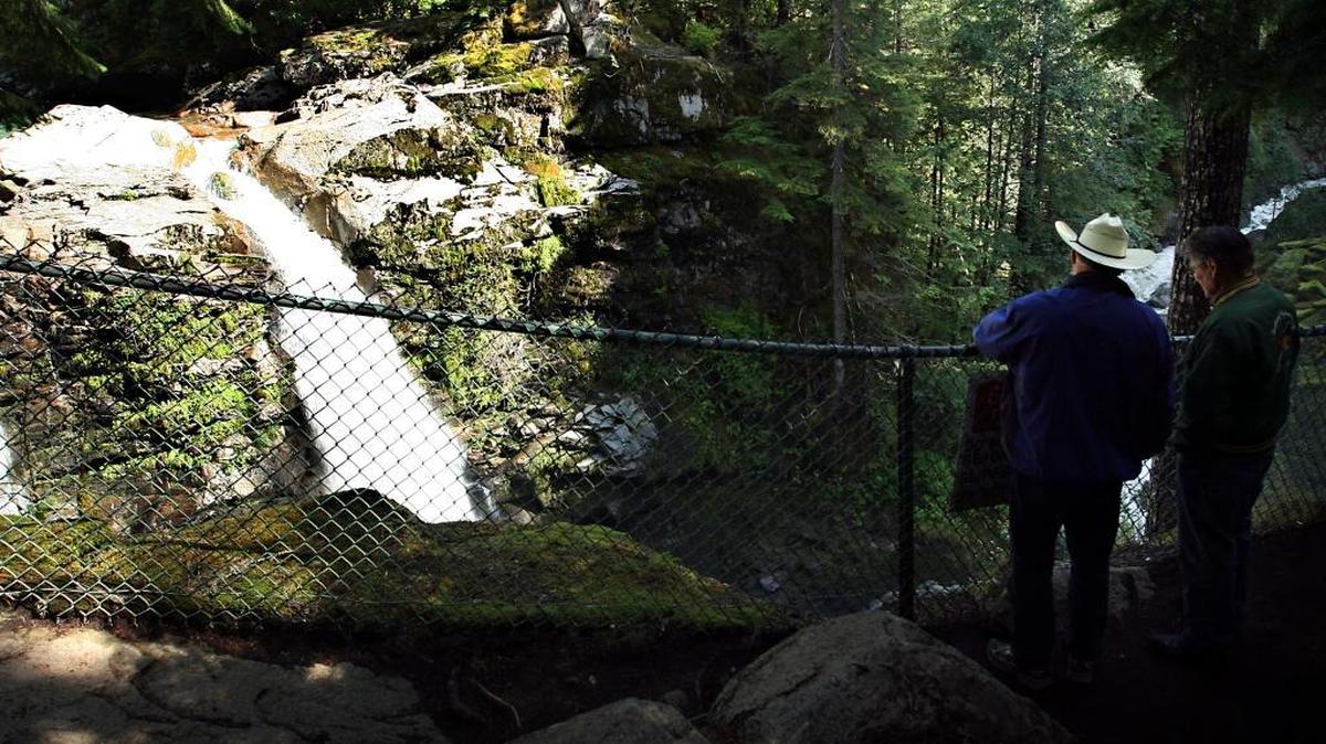 Visitors watch Nooksack Falls from the observation area in 2008.