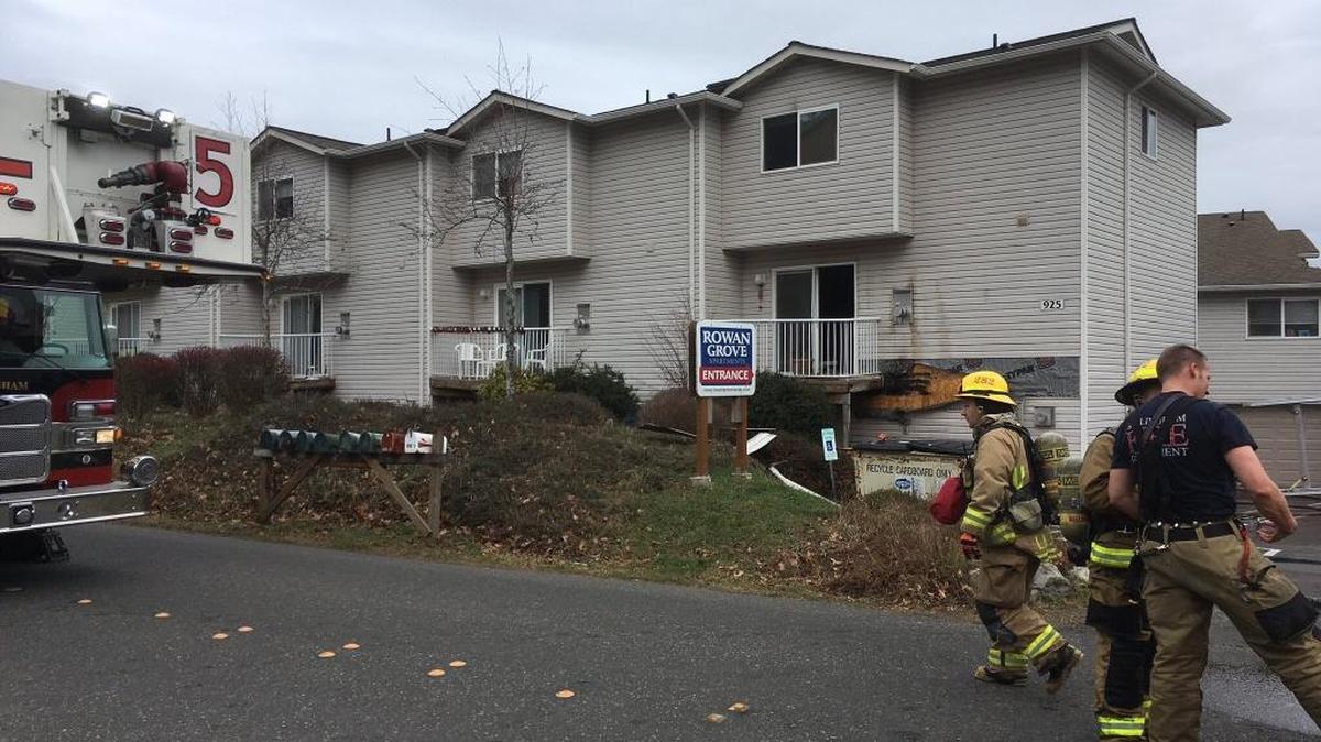 Bellingham Fire crews are shown at the Christmas Day fire in the Rowan Grove Apartments on 20th Street in the Happy Valley neighborhood of Bellingham.