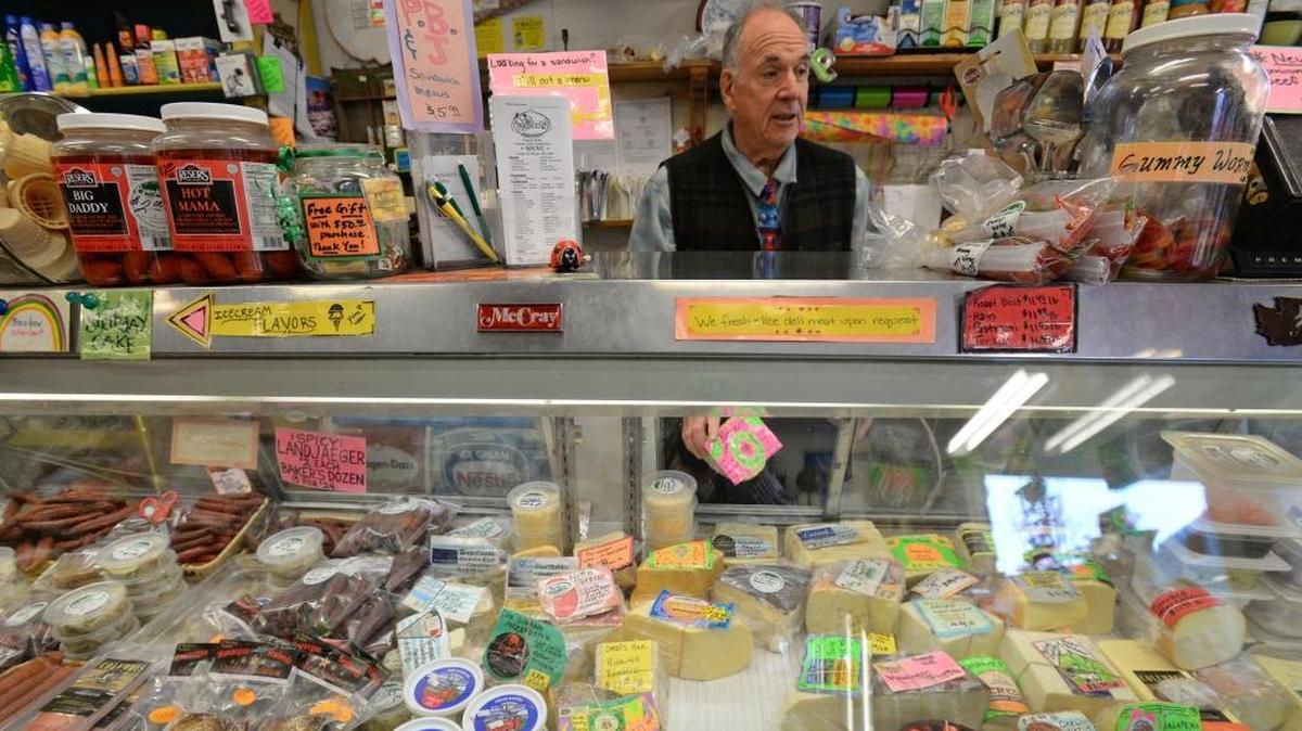 Owner Jeff Margolis, slices a sample of cheese at the Everybody's Store in Van Zandt Wednesday, Nov. 8, 2017. Everybody's Store will have the 47th annual Cheese Fest, from 11 a.m. to 5 p.m. Saturday, Nov. 19.