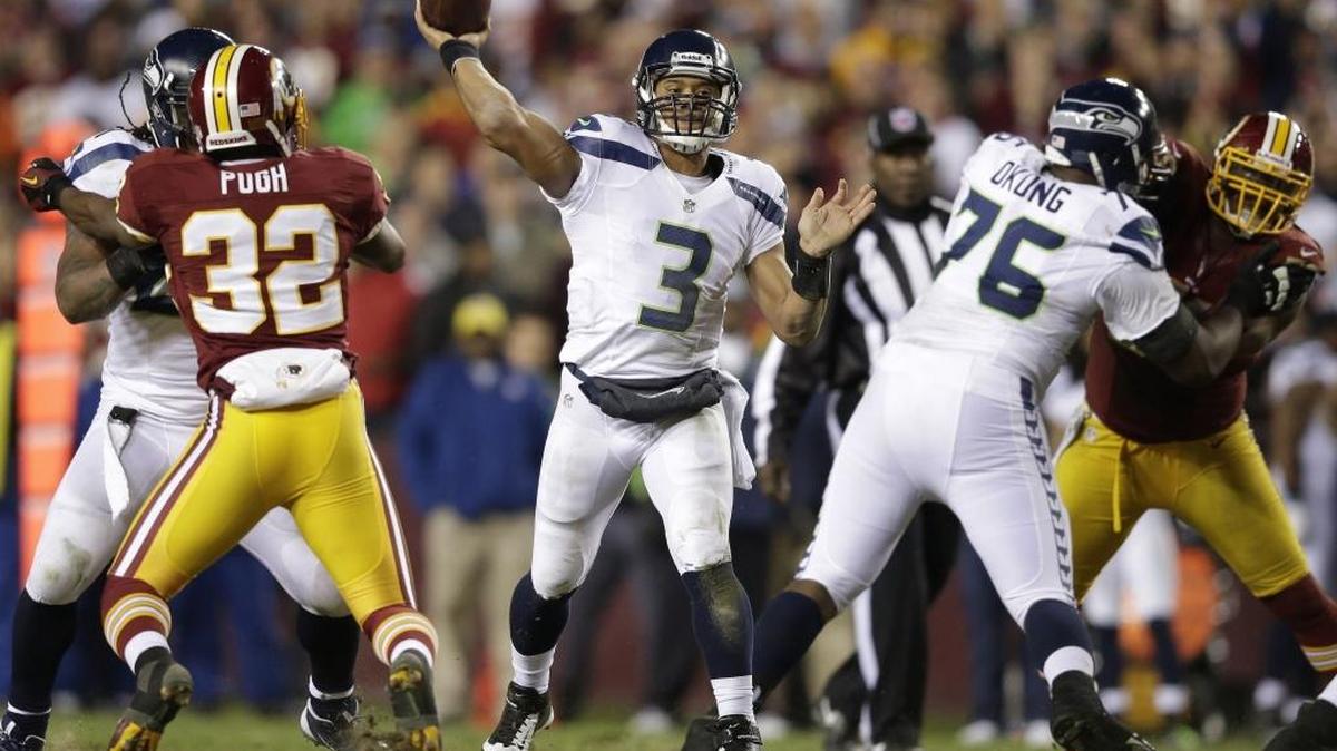 Seattle Seahawks quarterback Russell Wilson passes the ball during the second half of an NFL wild card playoff football game against the Washington Redskins in Landover, Md., Sunday, Jan. 6, 2013.