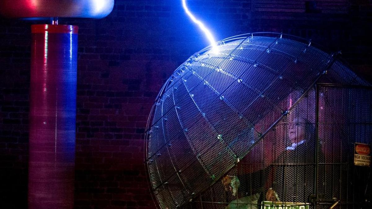 
Benjamin Franklin, played by actor Christopher Lowell, faces The Mighty MegaZapper at the conclusion of an educational performance of “Ben Franklin LIVE” on Saturday, Oct. 17, at Spark Museum of Electrical Invention in Bellingham.
