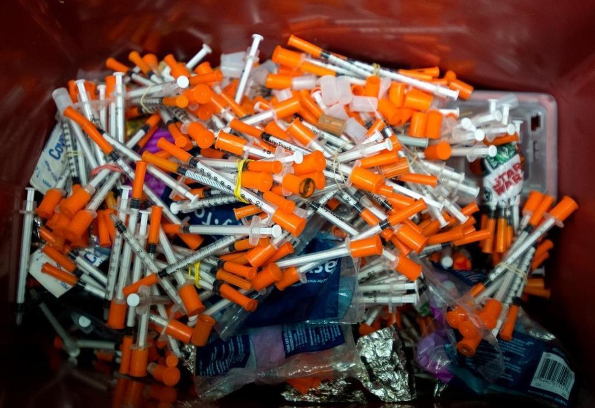 About 1,000 used needles sit in a bin at the Syringe Services Program office at the Whatcom County Health Department in 2016 in Bellingham. Needle exchange program participants can exchange used needles for new, sterile ones. The health department is expanding the program to include a mobile service that goes out to Maple Falls, Birch Bay and, soon, Ferndale.