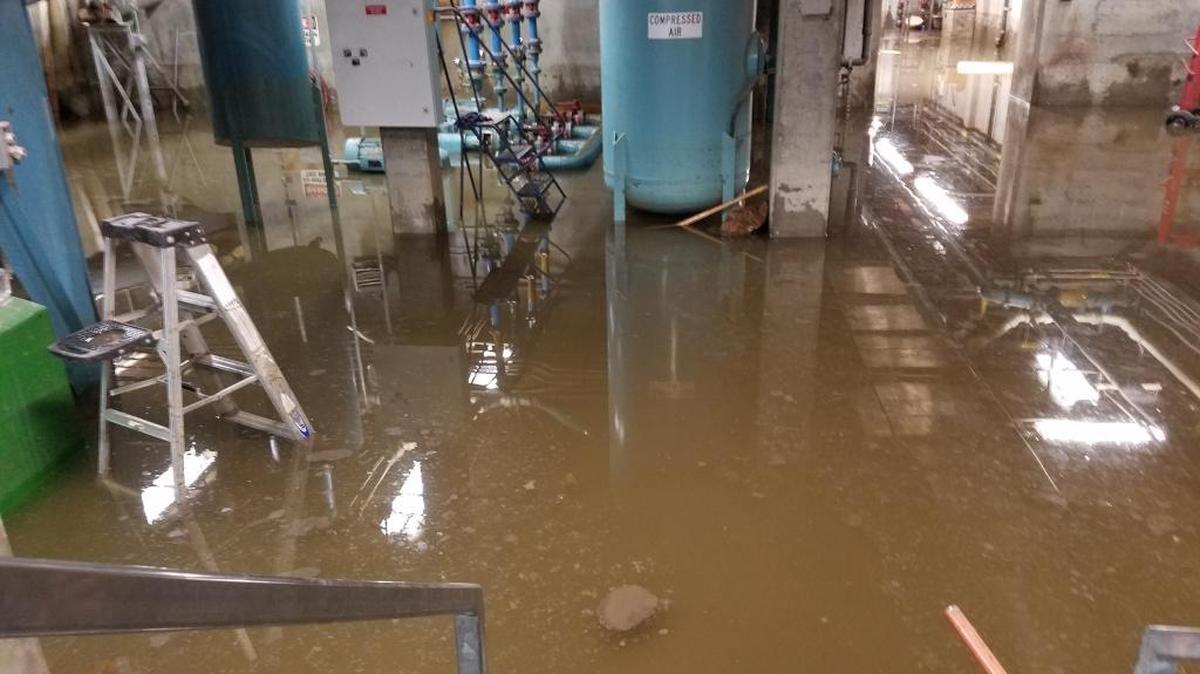 Treated wastewater from a broken pipe floods the underground “gallery” at the Post Point sewage treatment plant in Fairhaven on Saturday.