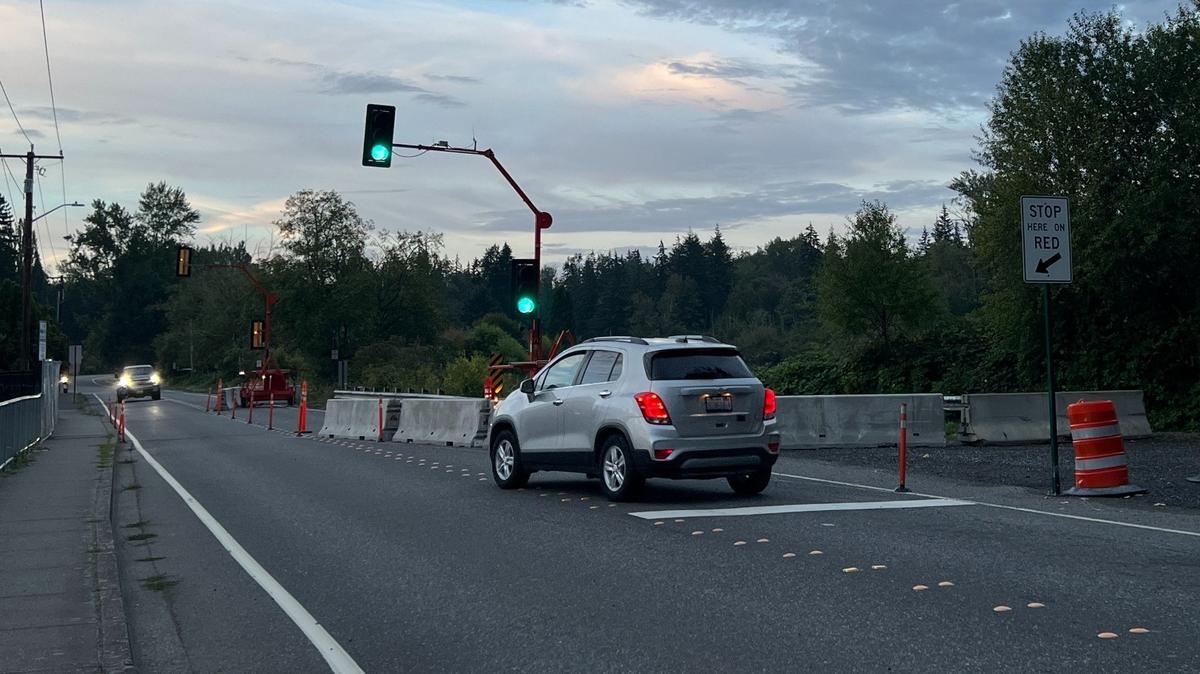 Drivers wait to cross the Electric Avenue bridge over the west side of Lake Whatcom in August.