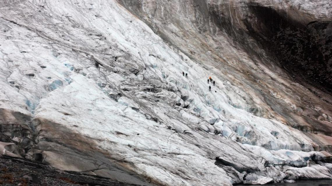 
In this Aug. 7, 2015, photo a team of scientists climb Sholes Glacier in Mount Baker, Wash. Glaciers on Mount Baker and other mountains in the North Cascades are thinning and retreating. Seven have disappeared over the past three decades, and the overall volume of glaciers in the range, while dozens others are losing mass.
