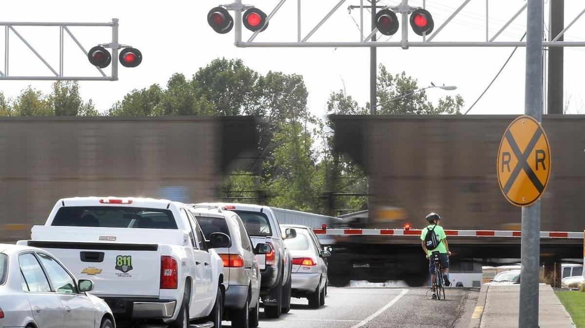 Cars back up at a railroad crossing in central Washington. BNSF is asking to close the Valley View Road crossing in Whatcom County to traffic so it can add a siding and park trains there. A hearing is Tuesday, Dec. 1.