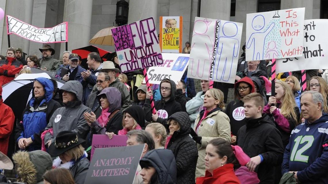 Opponents of a new state rule allowing transgender people to access to restrooms and locker rooms of their gender identity rally against the policy at the state Capitol Feb. 15.