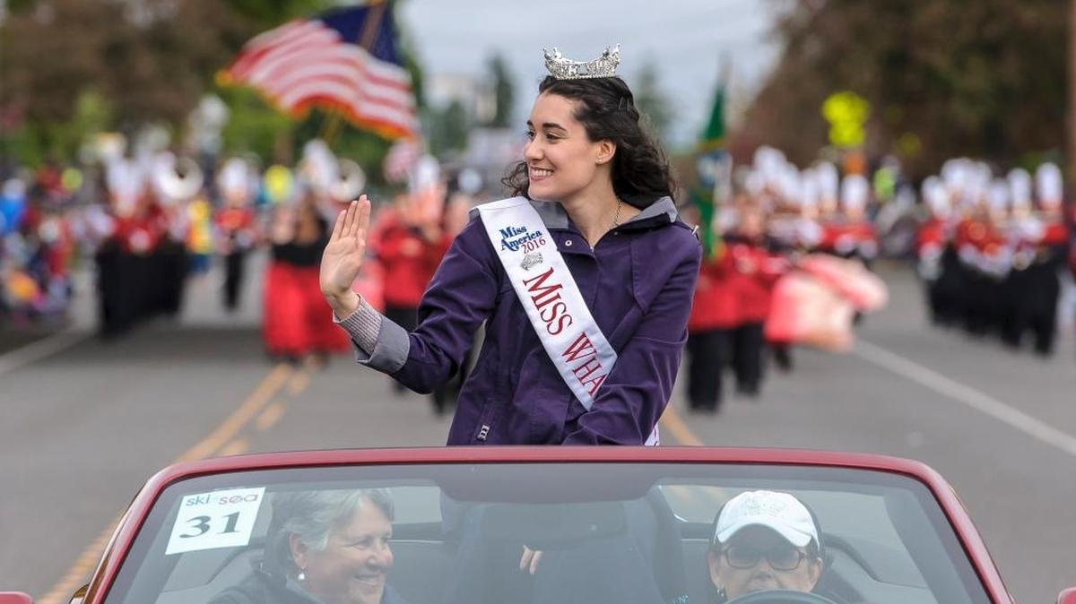 Angela Ramous, Miss Whatcom County 2016, waves as she leads the 2016 Blossomtime Parade Mac Master along Cornwall Avenue in Bellingham, May 28, 2016. Ramous will be a featured performer and speaker at the Miss Whatcom County Scholarship Pageant 2017 on Saturday.