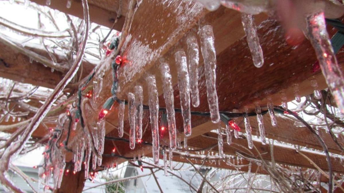 Icicles mingle with holiday decorations in Lynden Dec. 29, 2017. Saturday’s forecast calls for clouds and a 40 percent chance of showers with a high near 40 degrees, according to the National Weather Service in Seattle.