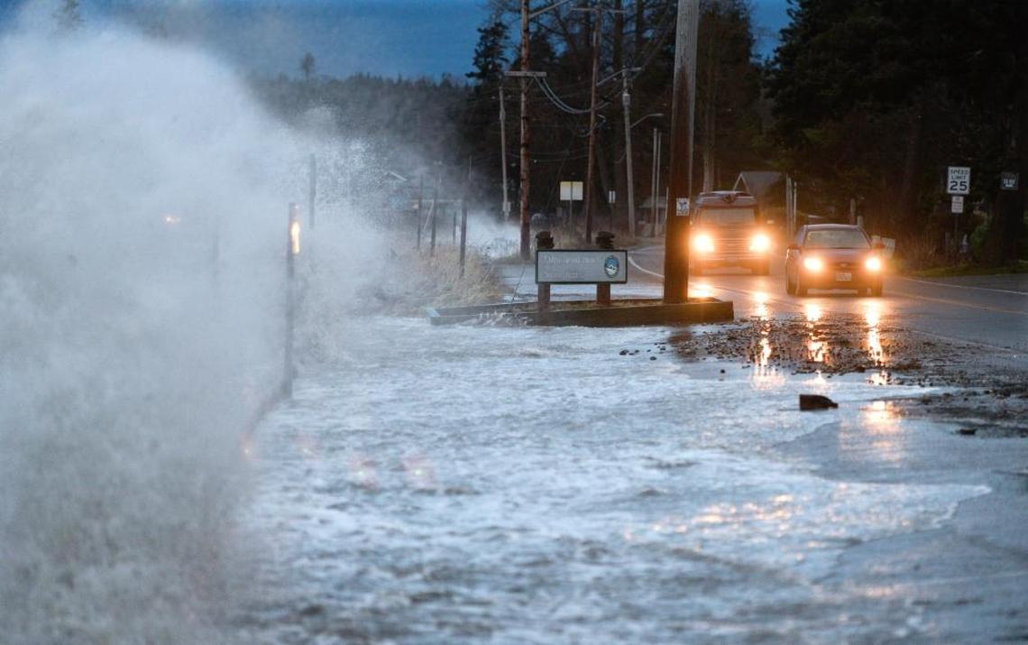 Waves break over Birch Bay Drive during high winds in 2014. High waves again are possible from one of two storm fronts moving through Whatcom County this week.