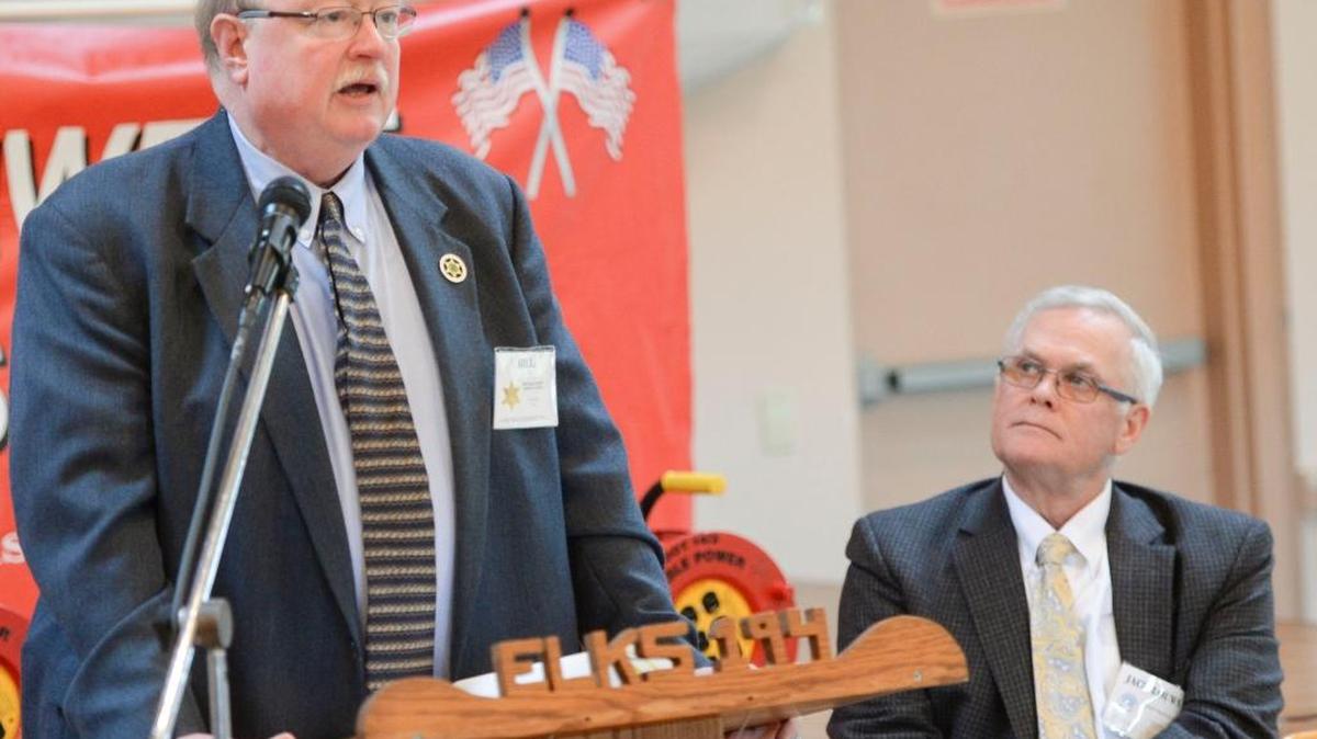 Whatcom County Sheriff Bill Elfo talks about the status of the jail while County Executive Jack Louws listens at the Northwest Business Club luncheon at the Elks Club in Bellingham on Wednesday, Jan 13, 2016.