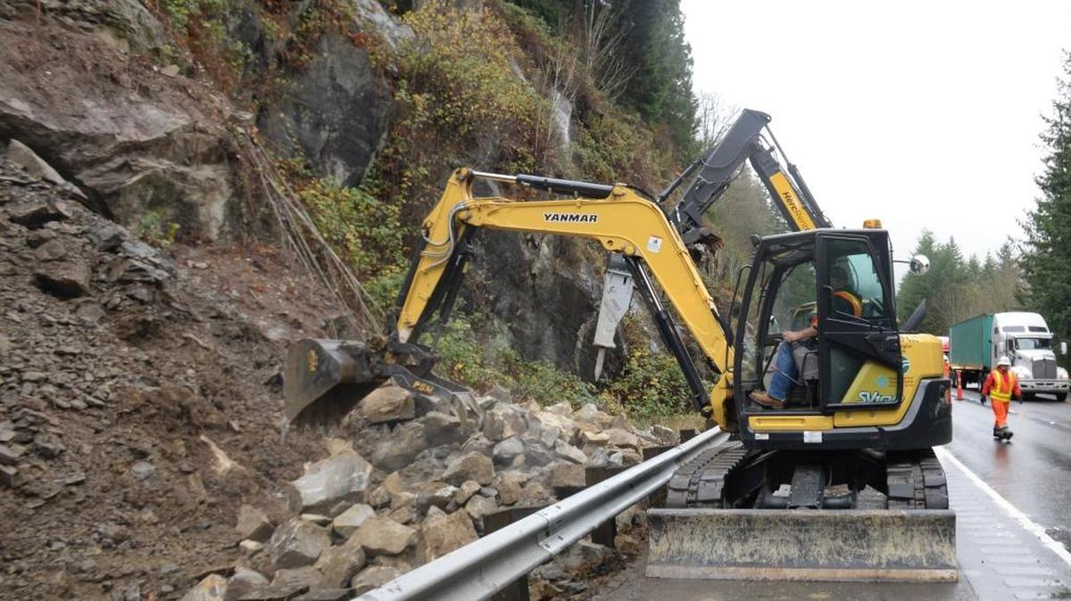Washington State Department of Transportation work crew removes rocks on the side of northbound Interstate 5 north of the Nulle Road exit on Monday, Nov 20, 2017. The crew also plans to close the right northbound lane at the site from 8:30 a.m. to 3 p.m. Tuesday, WSDOT said.
