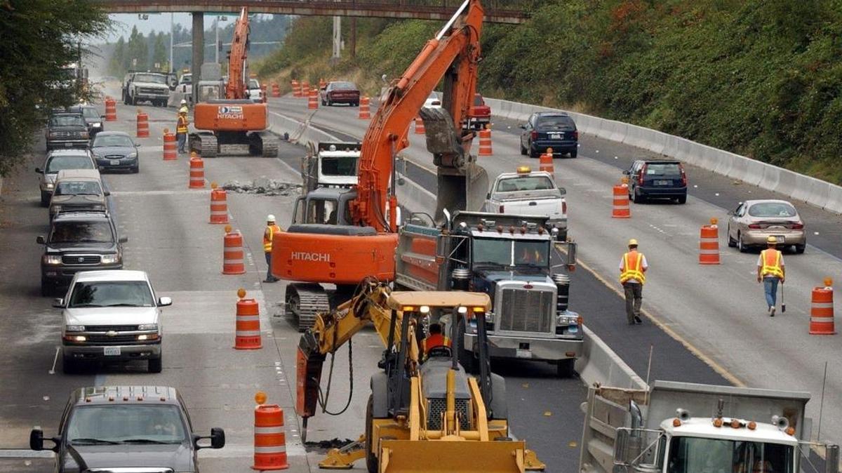 Crews close lanes of Interstate 5 for roadwork in 2003.