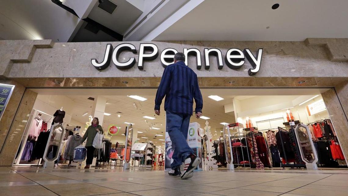 A shopper heads into a J.C. Penney store in Seattle.