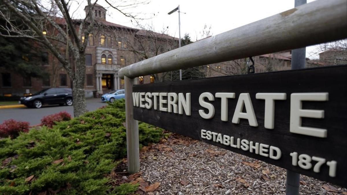 This Nov. 18, 2015, file photo shows a sign near the main entrance of Western State Hospital, the largest psychiatric hospital in the state, in Lakewood, Wash.